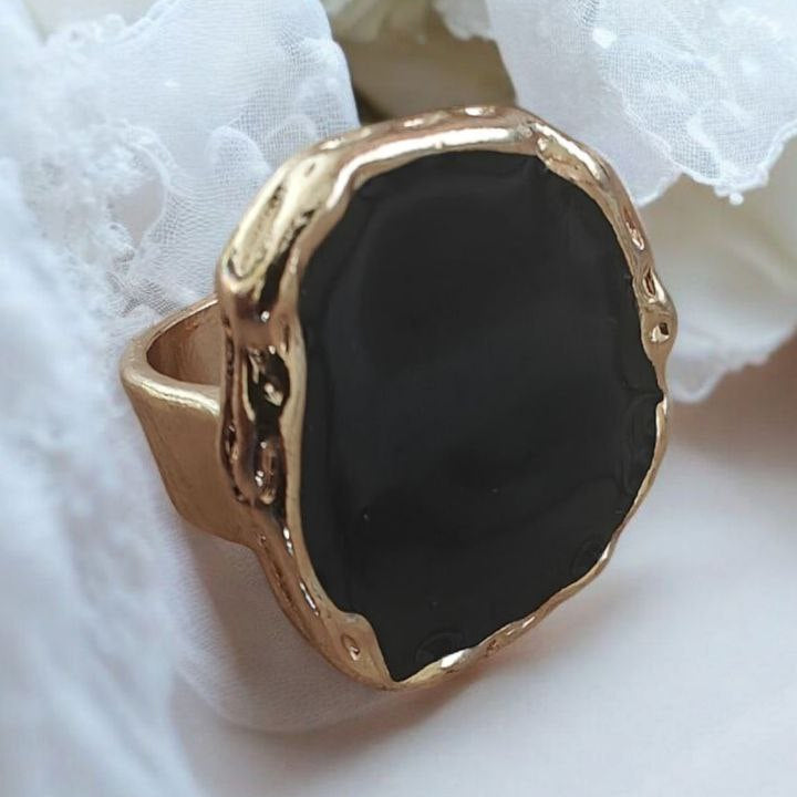 Gold ring with black stone showcasing AdairGems Bold Black Stone Statement Ring design