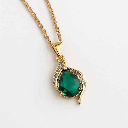 Gold necklace with stunning emerald teardrop pendant in AdairGems collection