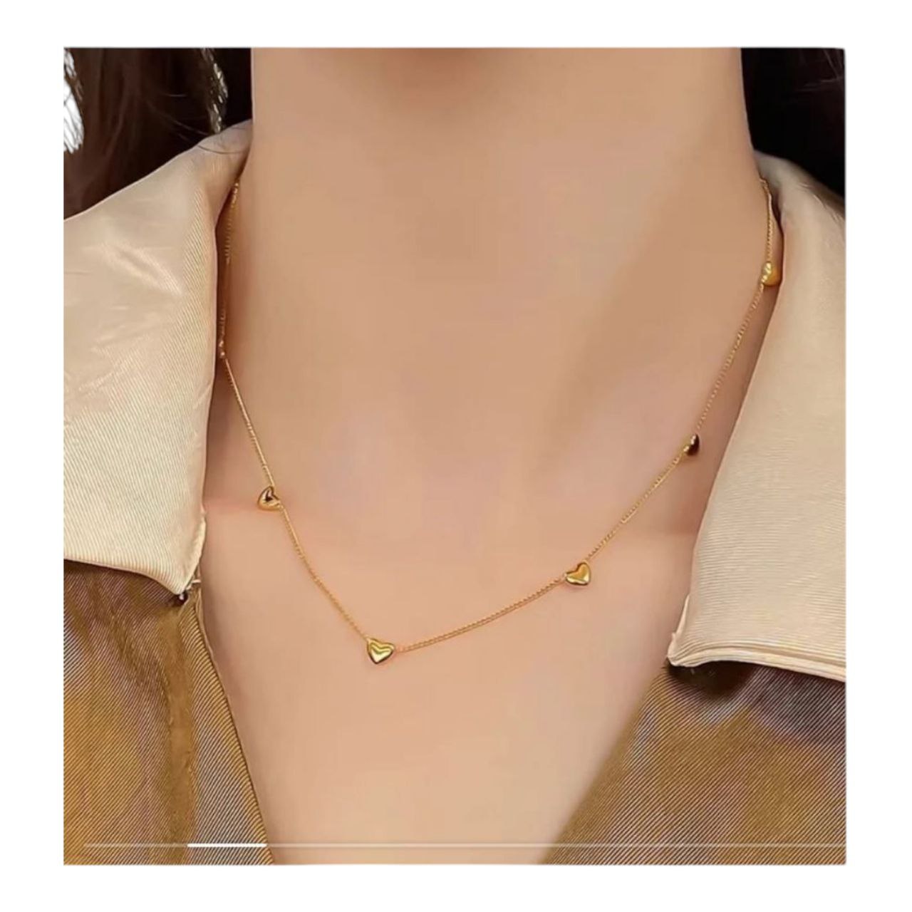 Gold heart pendant necklace showcasing a stunning golden heart chain jewelry piece